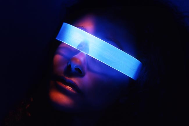 Blue colored fluorescent glasses under UV light