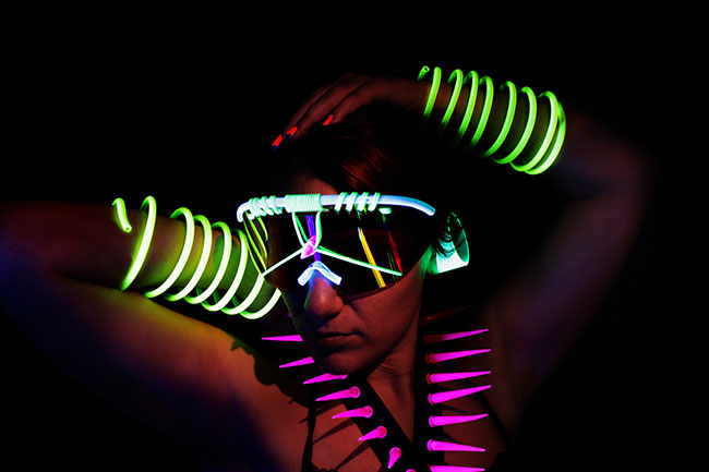 Glowing light-up costume with bracelets and spikes